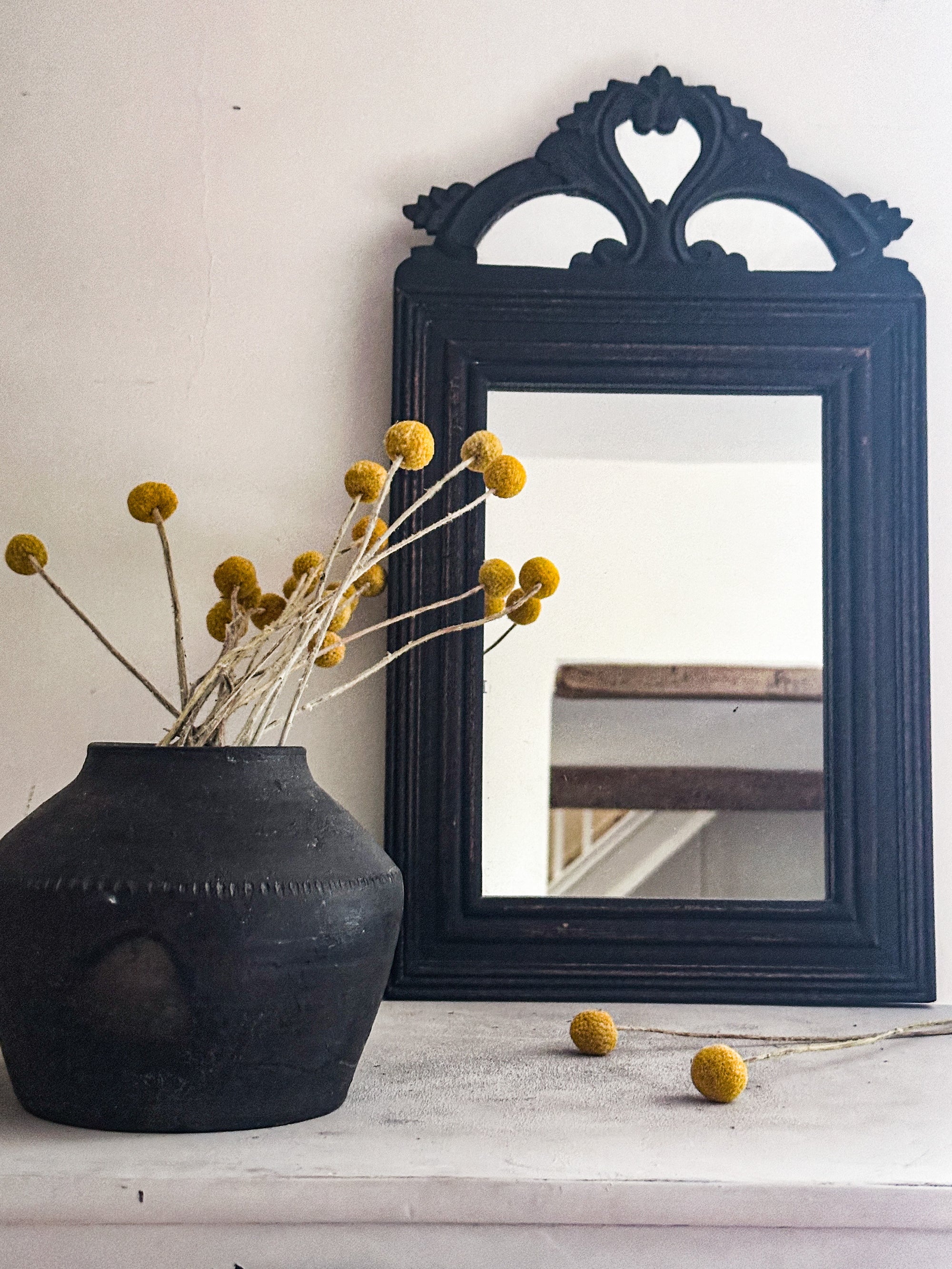 Black wooden vintage mirror