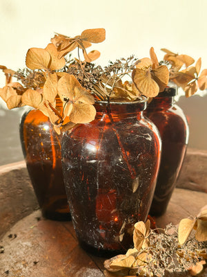 Vintage amber glass Virol bottle