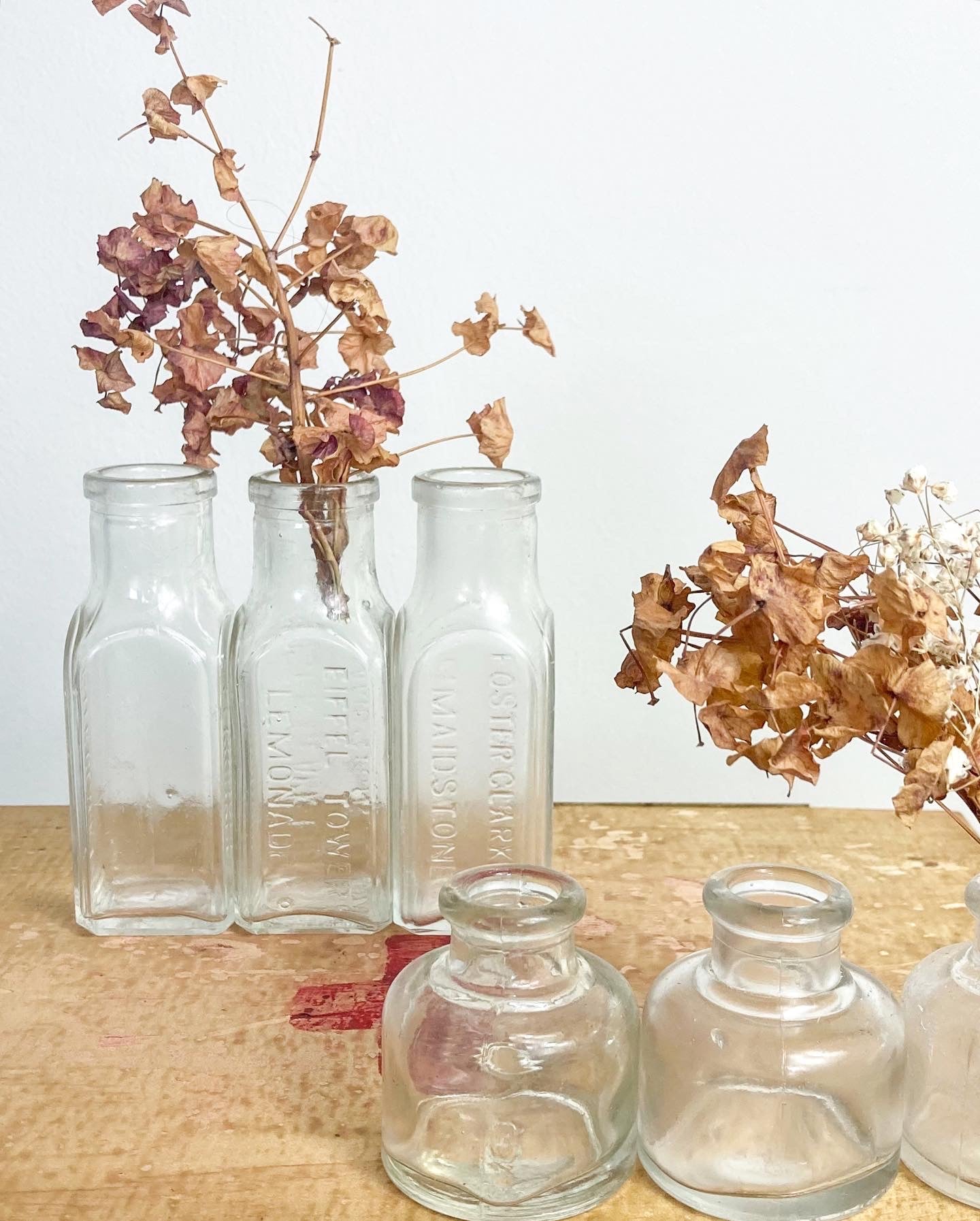 Eiffel Tower lemonade glass bottles as vintage wedding favours 