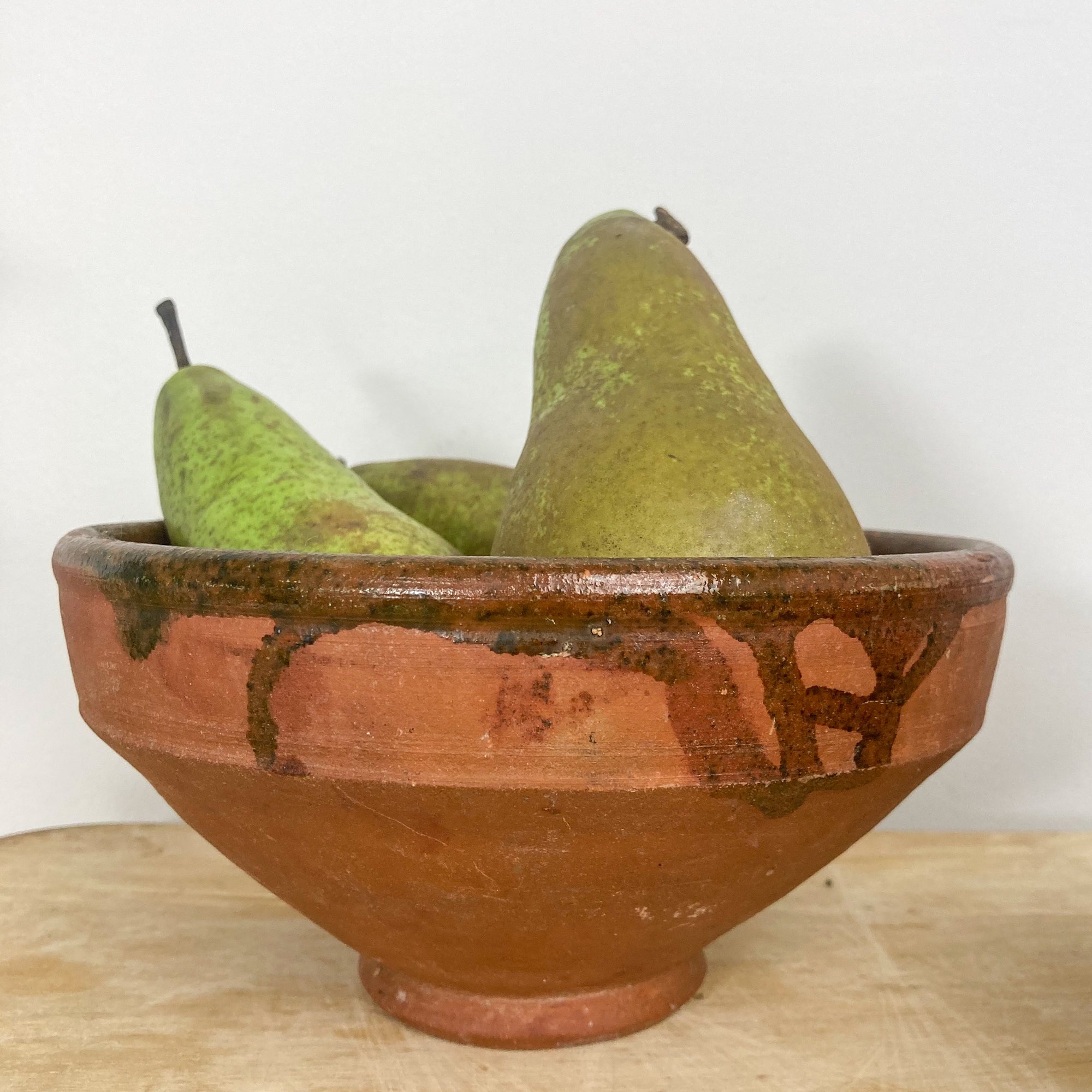 Vintage terracotta bowl as part of a post about French brocantes and vintage home decor 