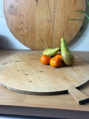 Round vintage wooden chopping board