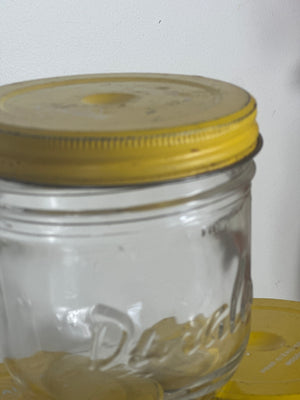 Vintage French glass storage jars yellow top
