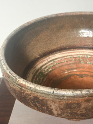 Terracotta slipware bowl folk art pattern