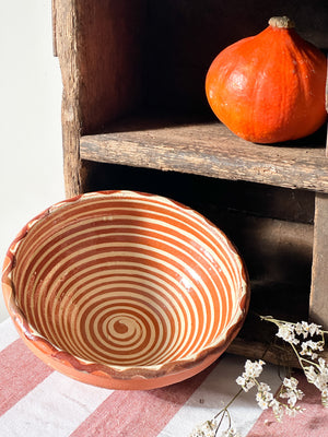 Terracotta bowl cream spiral pattern