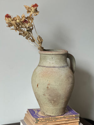 Rustic stoneware pitcher with handle