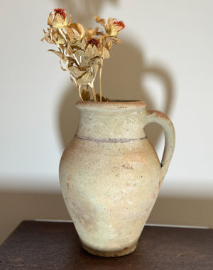 Rustic stoneware pitcher with handle