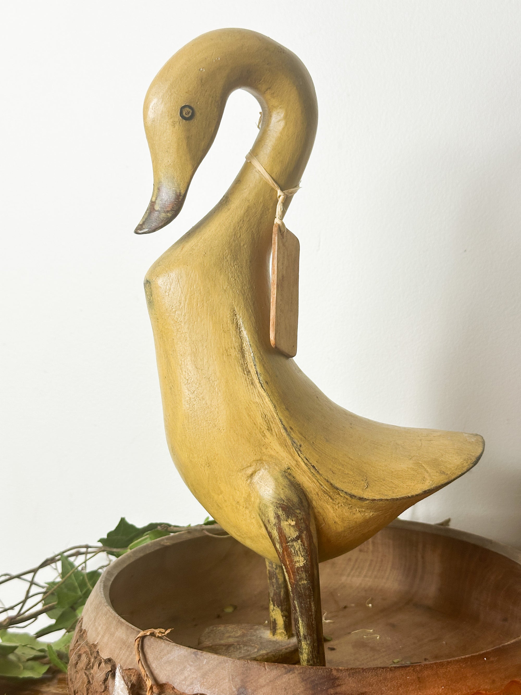 Vintage yellow wooden duck