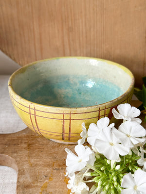 Yellow patterned vintage slipware bowl