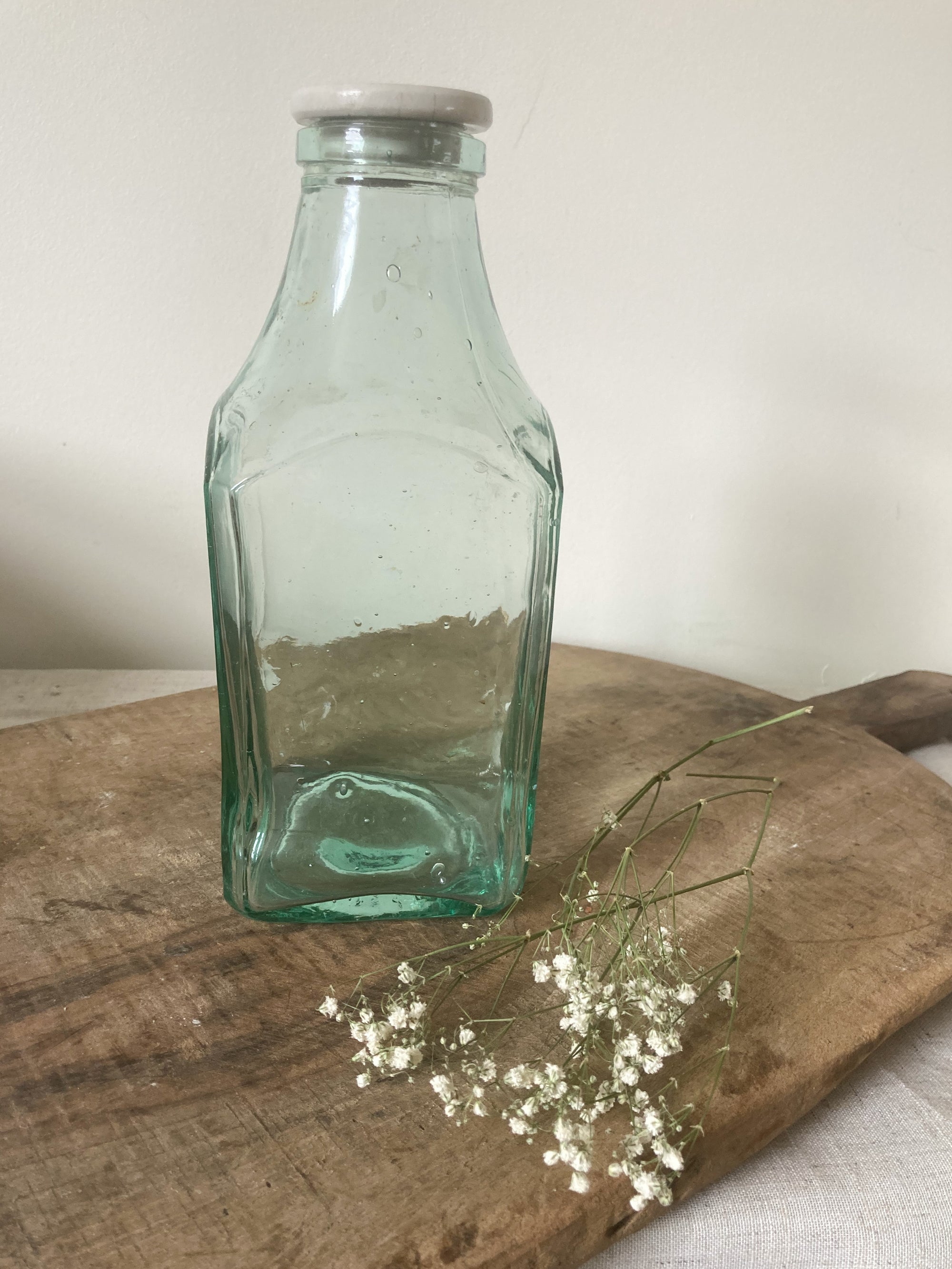 Vintage green glass pickling jar with white lid