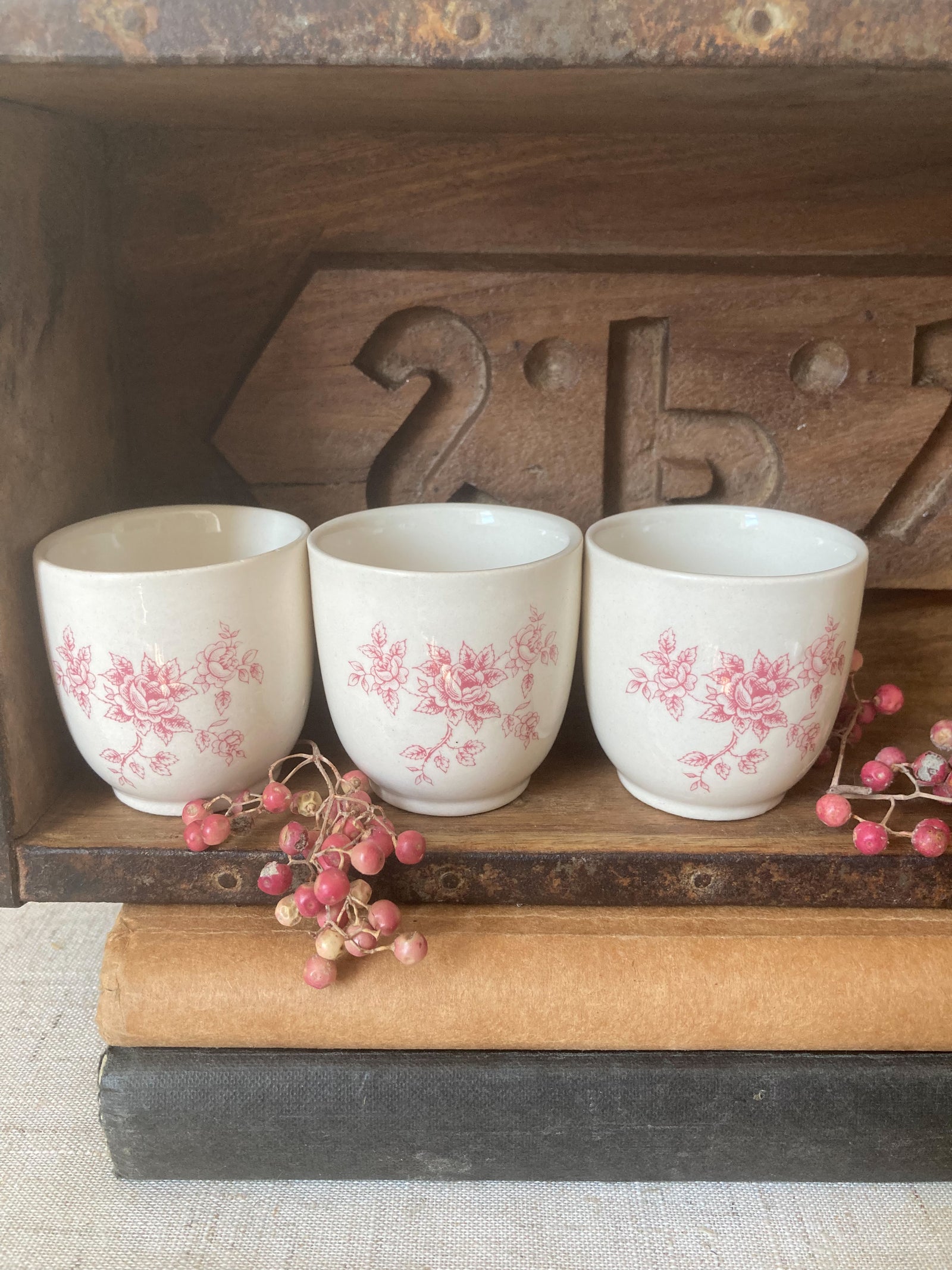 Set of 3 pink and cream floral porcelain egg cups