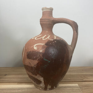 Rustic oil pitcher