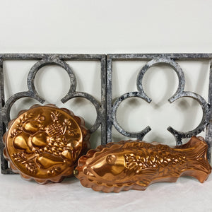 Round copper coloured fruit mould
