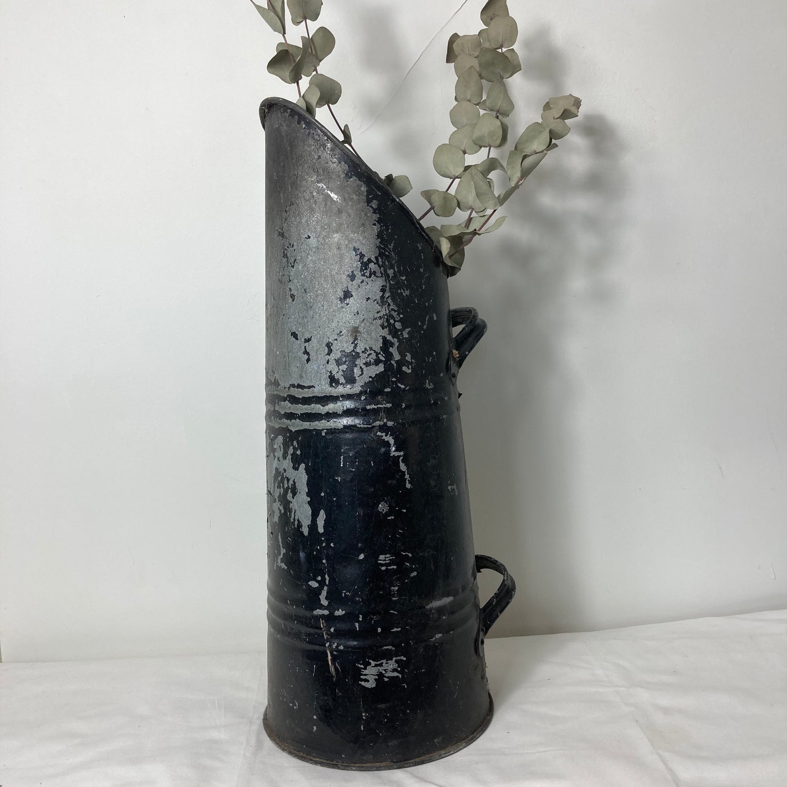Large black rustic pitcher
