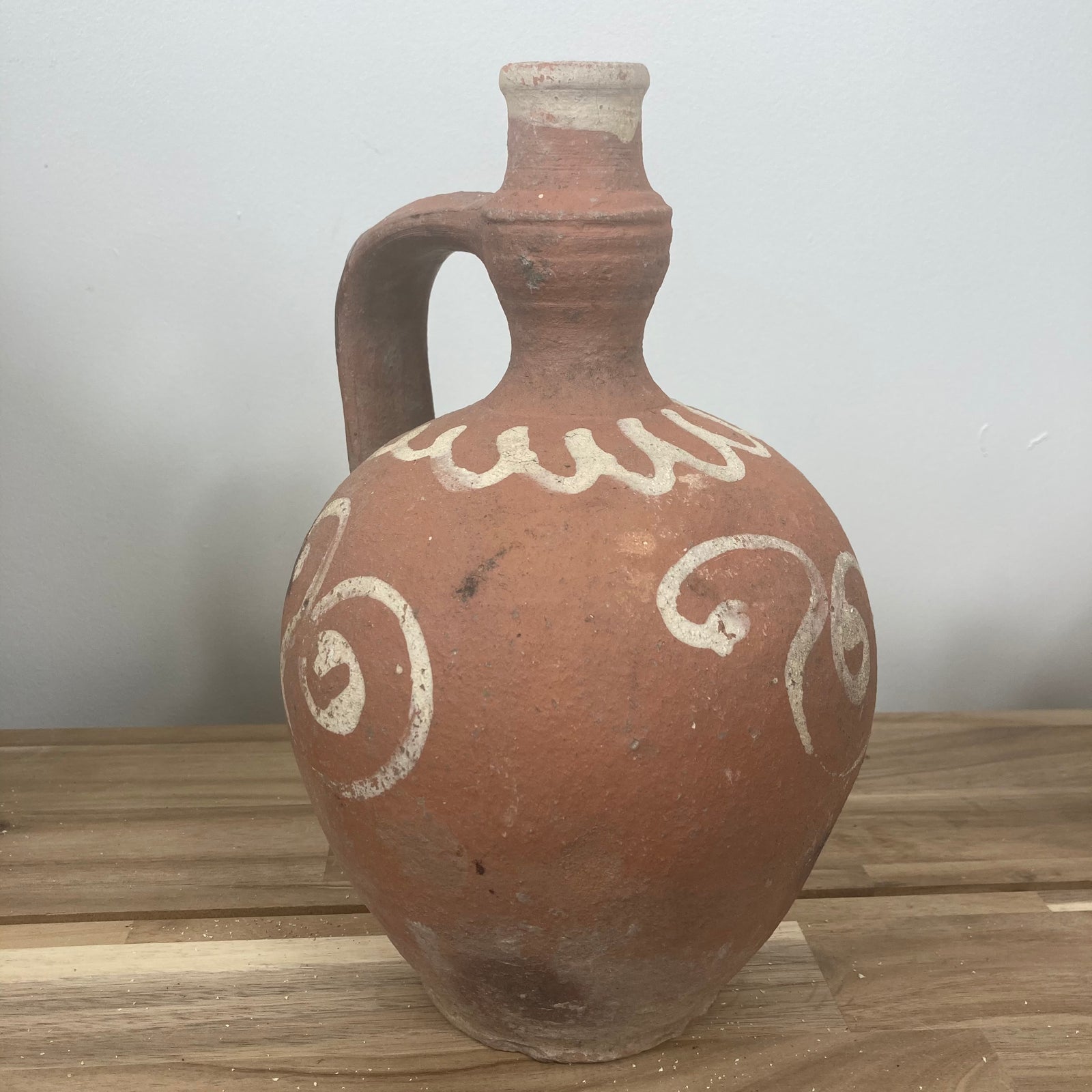 Rustic oil pitcher