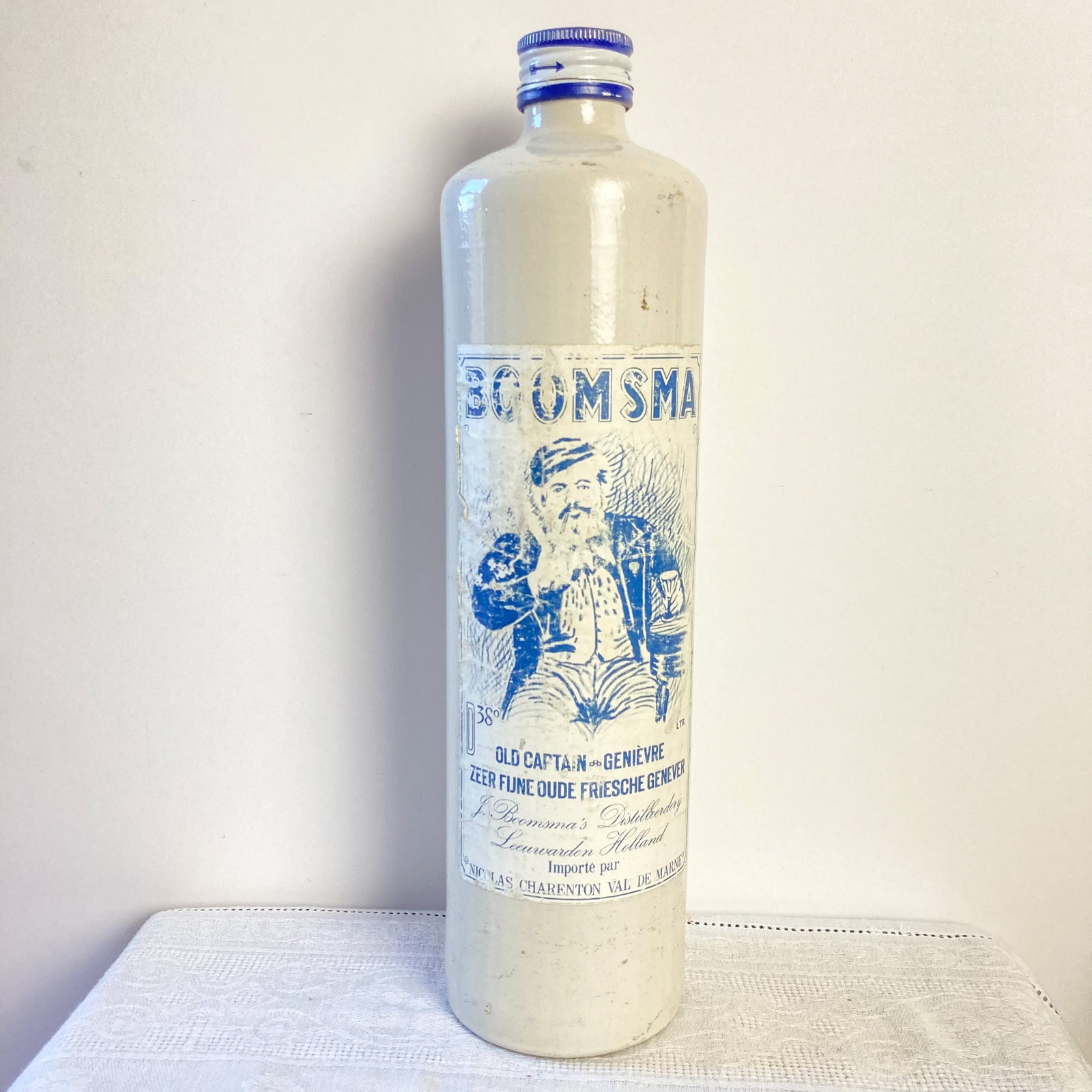 Blue and cream stoneware bottle